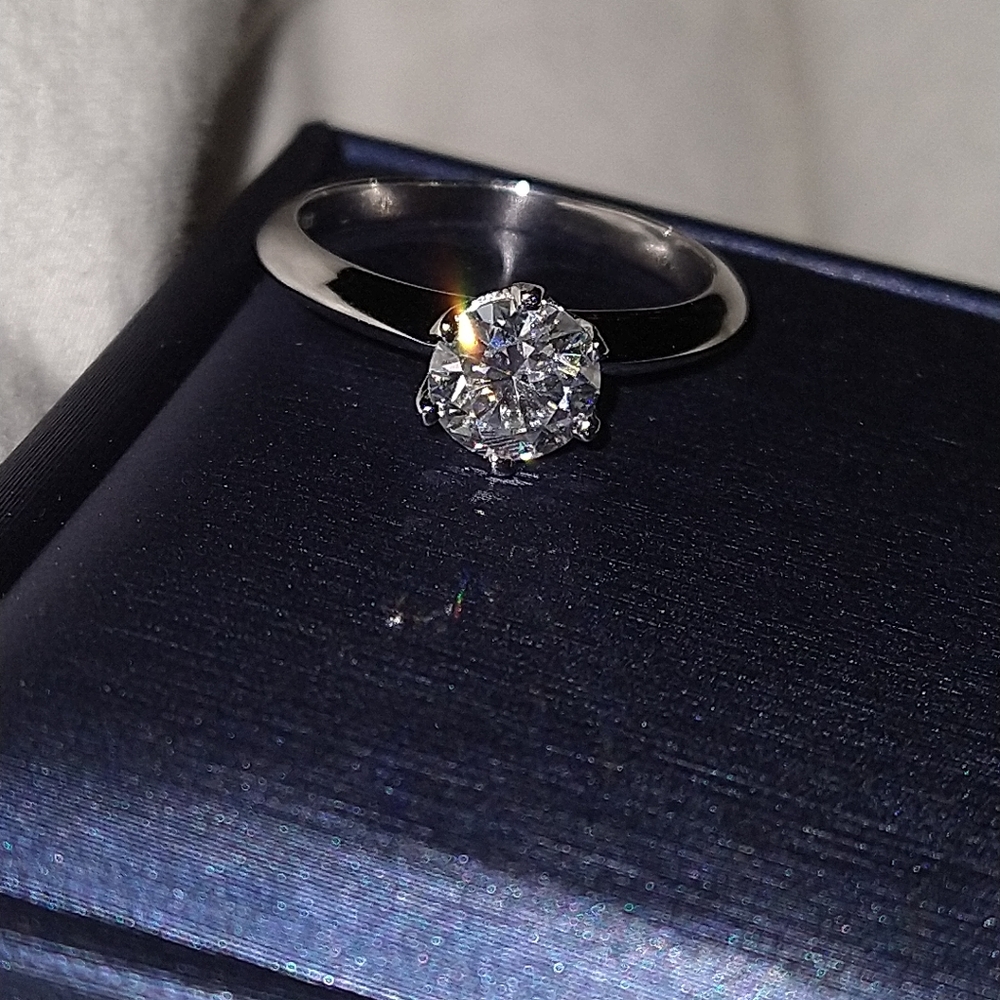 1ct. Moissanite solitaire size 8